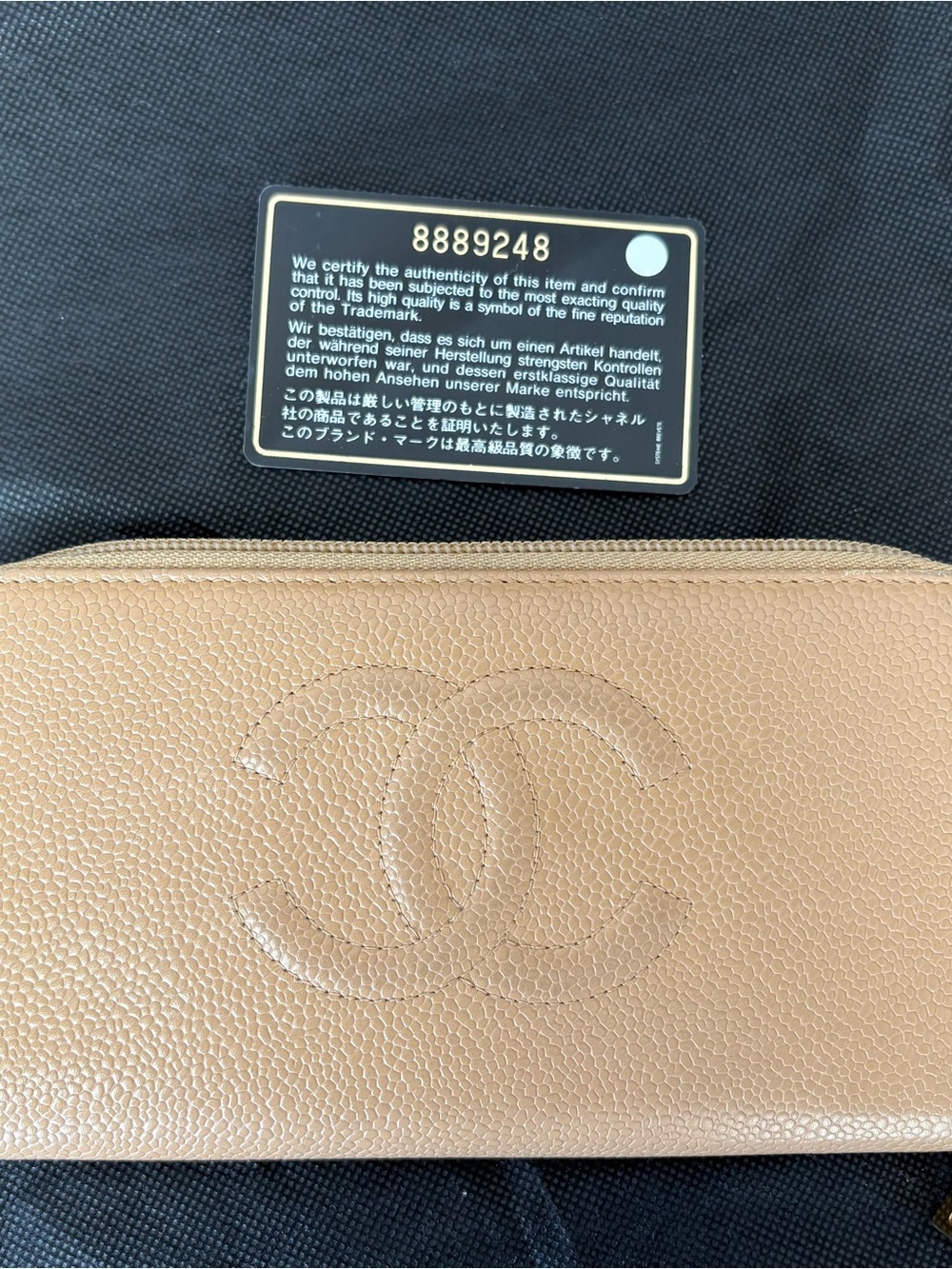 CHANEL Beige Caviar Leather Zip Wallet with Embossed CC